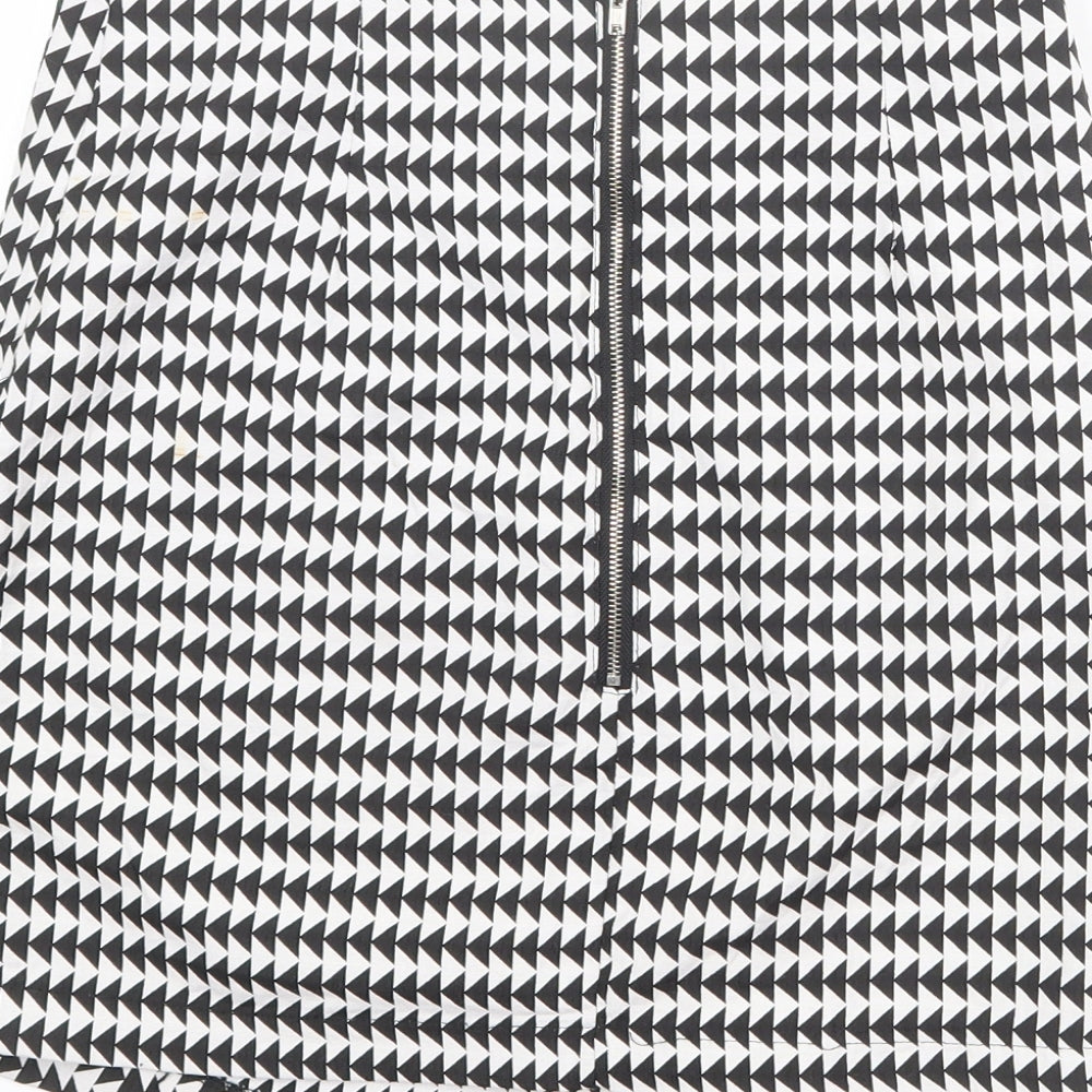 Brand and care label for Missguided women’s black geometric polyester a-line skirt, size UK 8, zip