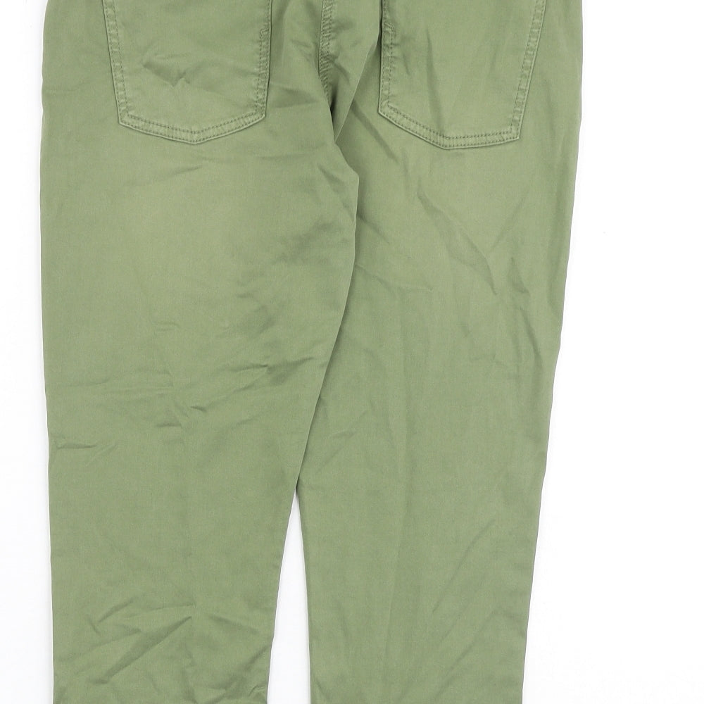 Brand and care label for EDC women’s green cotton skinny jeans, size UK 12, regular zip