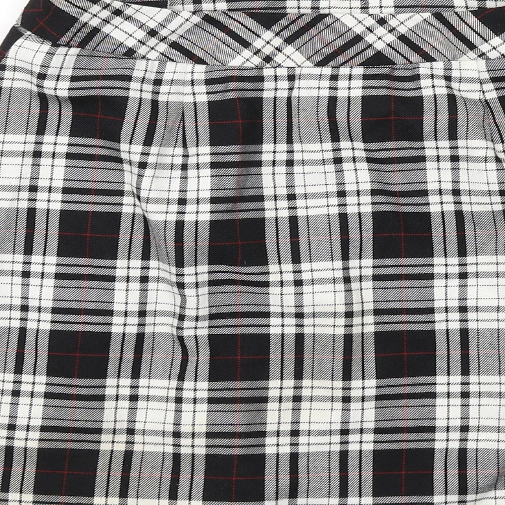 Brand and care label for Cooperative women’s black plaid viscose mini skirt, size S, button