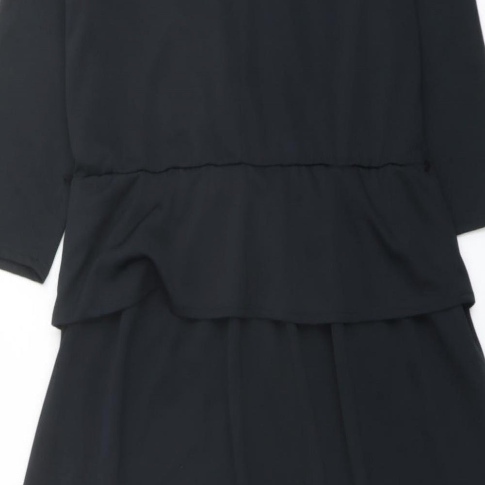 Brand and care label for C&A women’s black polyester a-line, size UK 12, cowl neck pullover