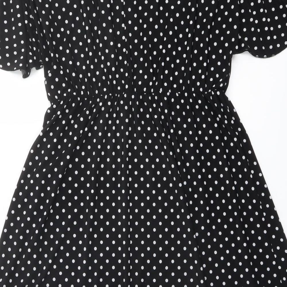 Brand and care label for Red Herring women’s black polka dot polyester a-line, size UK 10, v-neck pullover