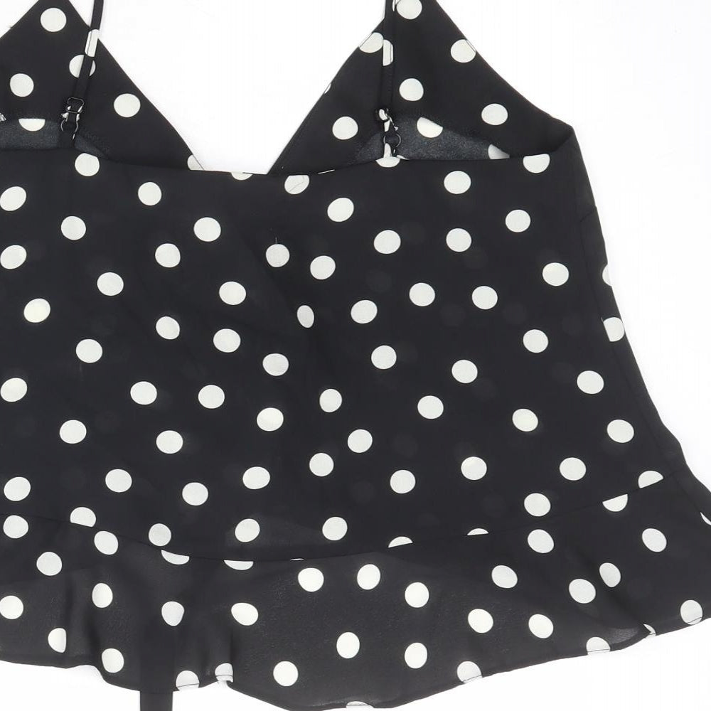 Brand and care label for ASOS women’s black polka dot polyester cropped tank, size UK 10, v-neck