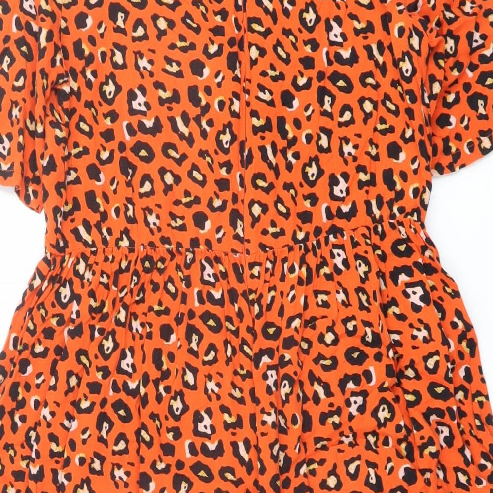 Brand and care label for ASOS women’s orange animal print viscose a-line, size UK 10, round neck zip - leopard pattern
