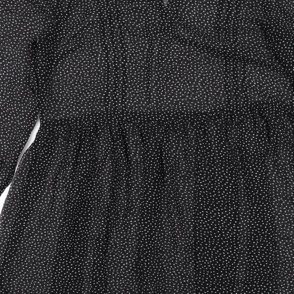 Brand and care label for Red Herring women’s black polka dot polyester a-line, size UK 10, round neck pullover