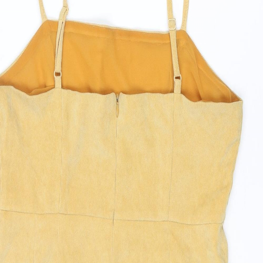 Brand and care label for Cooperative women’s yellow polyester slip dress, size M, scoop neck zip