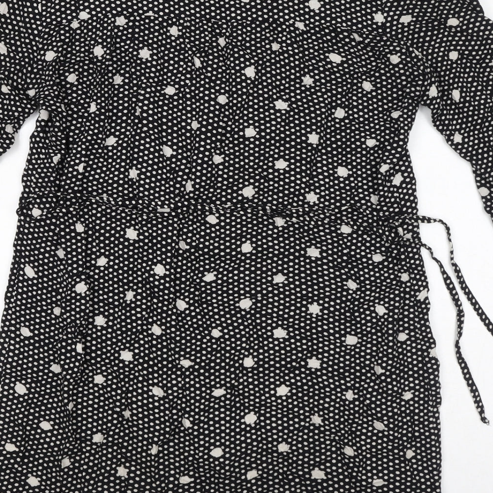 Brand and care label for Only women’s black polka dot viscose a-line, size UK 10, v-neck pullover