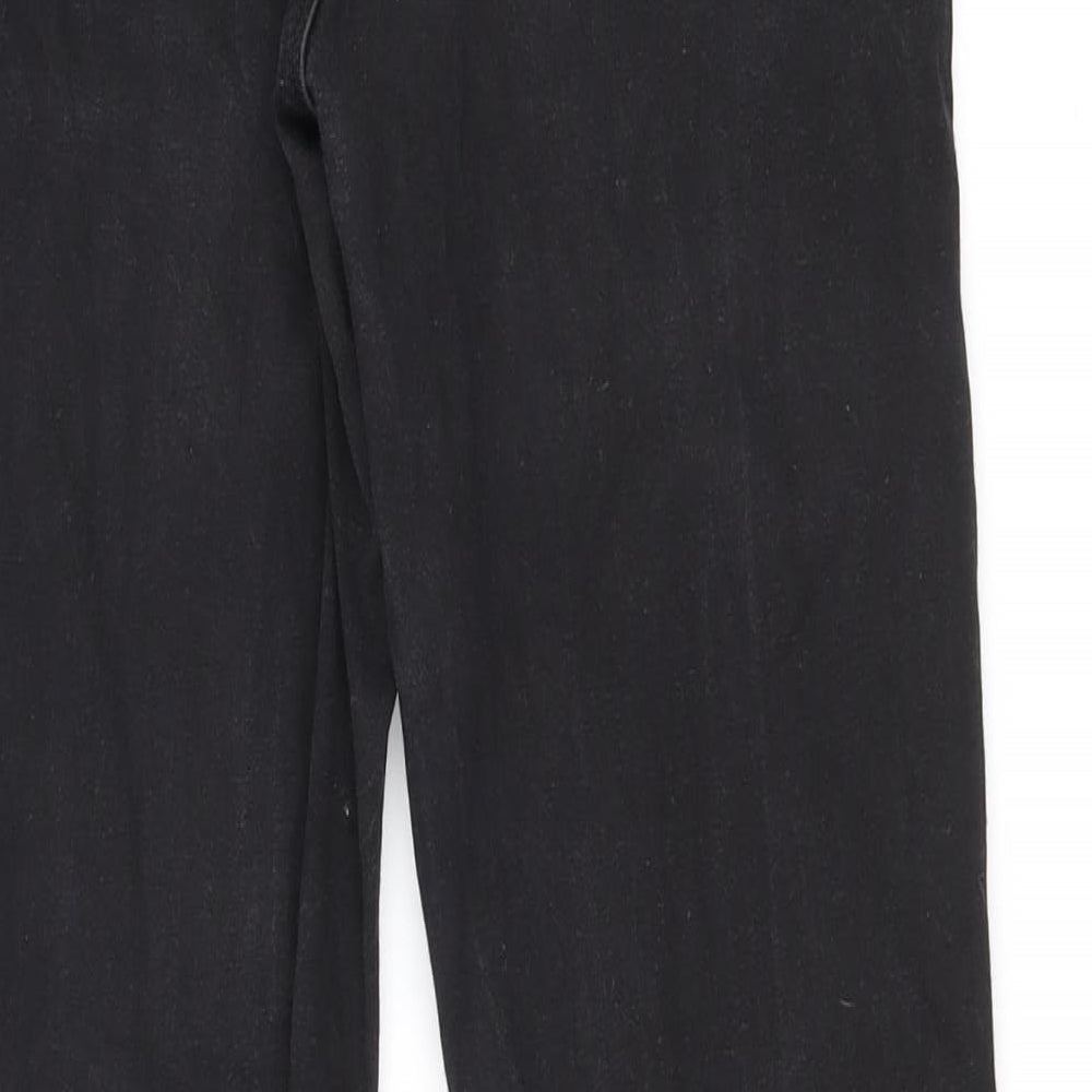 Brand and care label for ASOS women’s black cotton skinny jeans, size UK 26, in, 32-inch leg regular zip