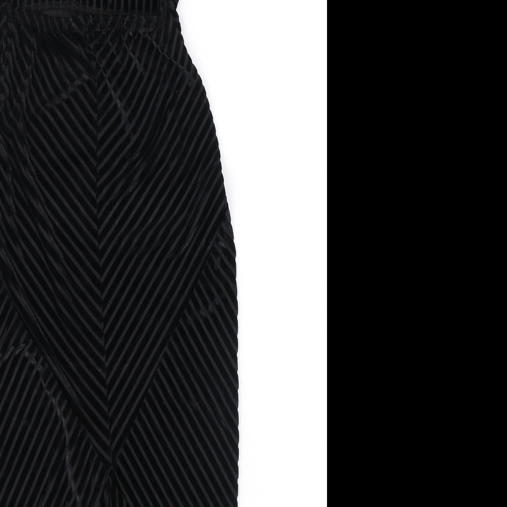 Brand and care label for Missguided women’s black polyester tank dress, size UK 4, square neck pullover - open back