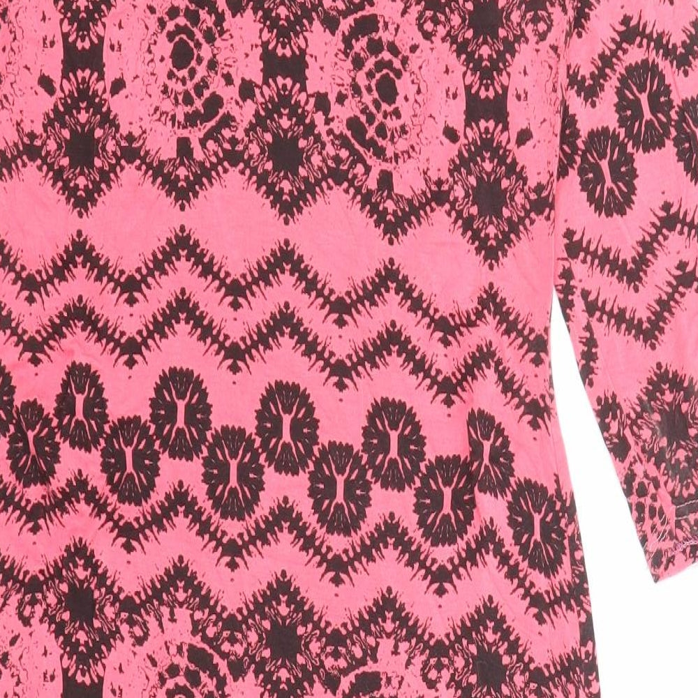 Brand and care label for Club L women’s pink geometric viscose bodycon, size UK 14, round neck pullover