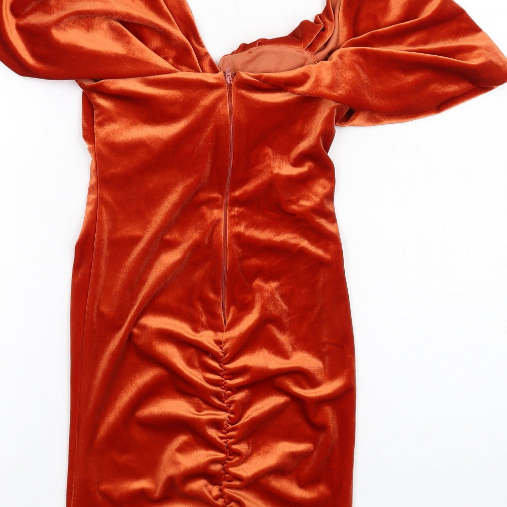 Brand and care label for ASOS women’s orange polyester mini, size UK 4, one shoulder zip