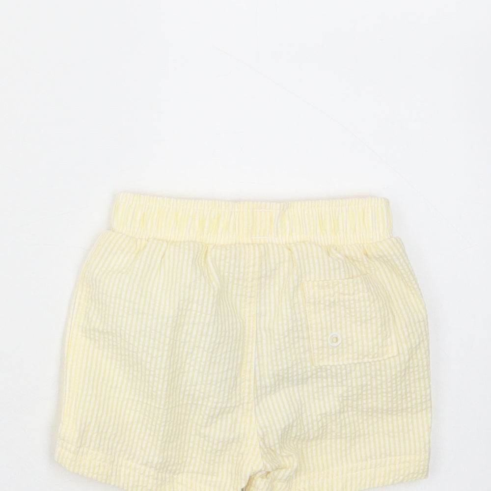 Brand and care label for Marks & Spencer girls’ yellow plaid cotton cropped trousers, size 3-6, months drawstring