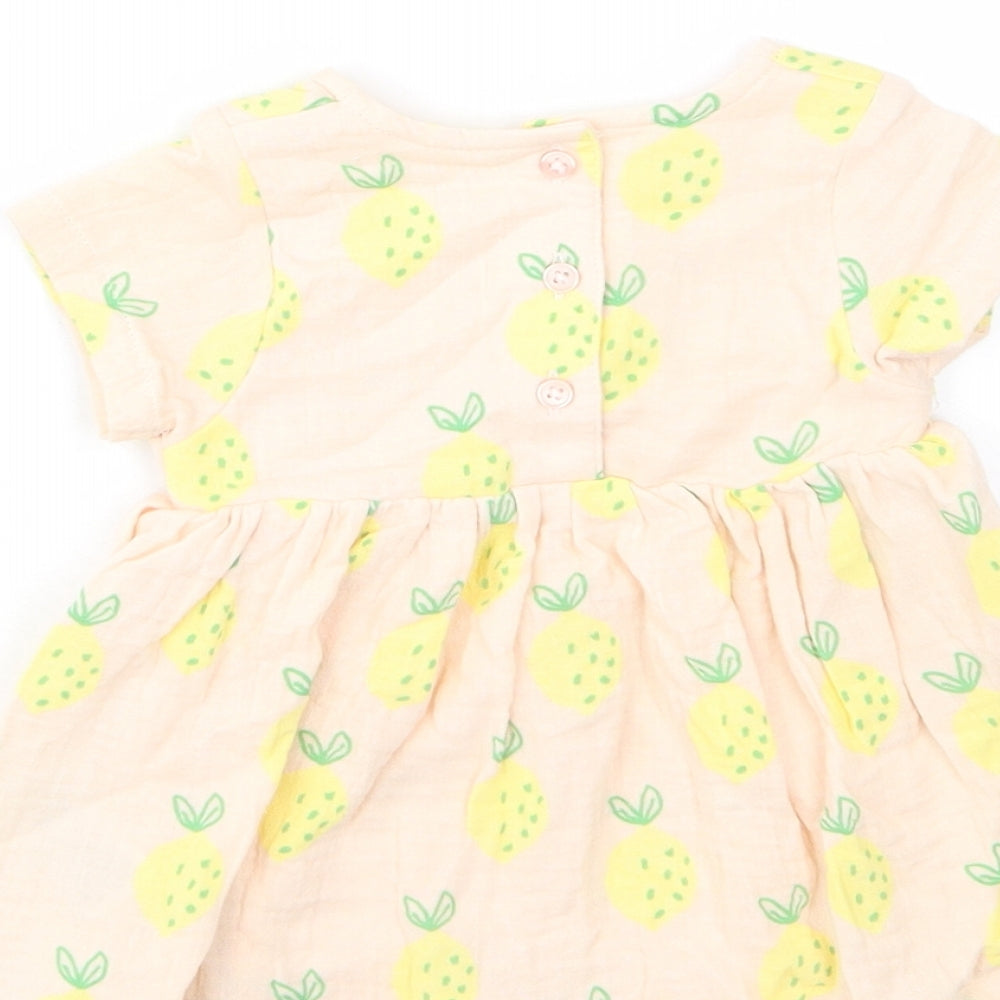 Brand and care label for Marks & Spencer girls’ beige geometric cotton a-line, months crew neck button - lemon print