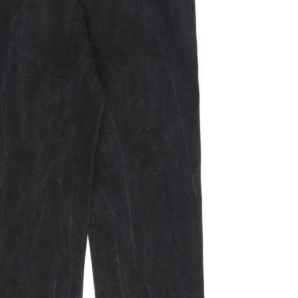 Brand and care label for ASOS women’s black cotton flared jeans, size UK 30, in, 32-inch leg regular zip