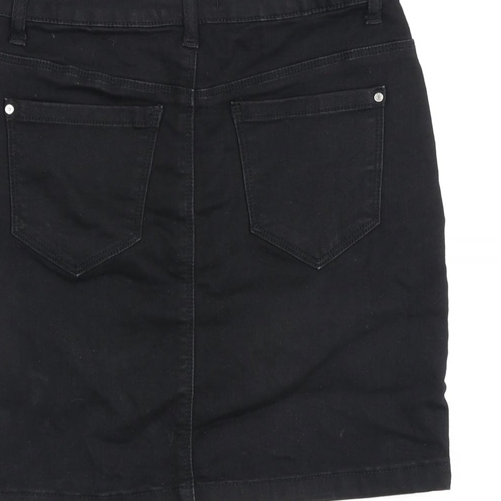 Brand and care label for Missguided women’s black cotton a-line skirt, size UK 8, zip