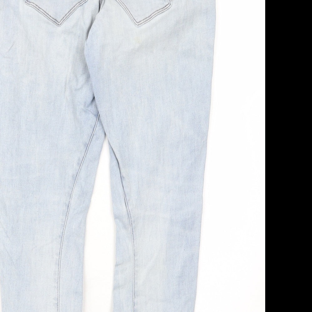 Brand and care label for G RAW women’s blue cotton skinny jeans, size UK 31, in regular zip - pockets, belt loops