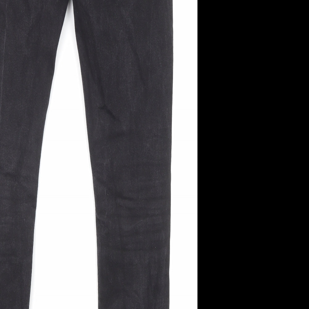 Brand and care label for ASOS men’s black cotton skinny jeans, size 30, in, 30-inch leg regular zip - pockets