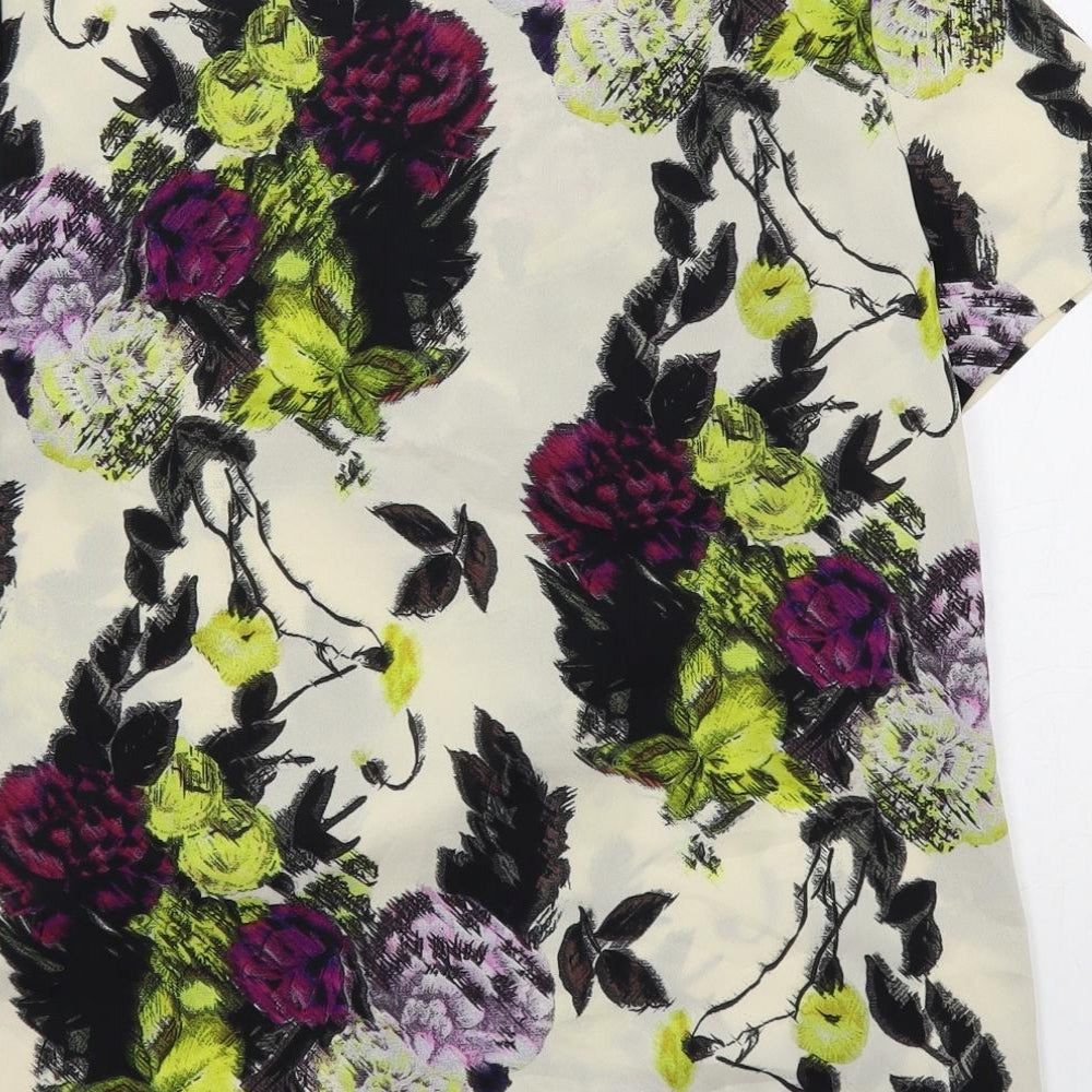 Brand and care label for Betty Jackson women’s multicoloured floral polyester basic blouse, size UK 12, boat neck