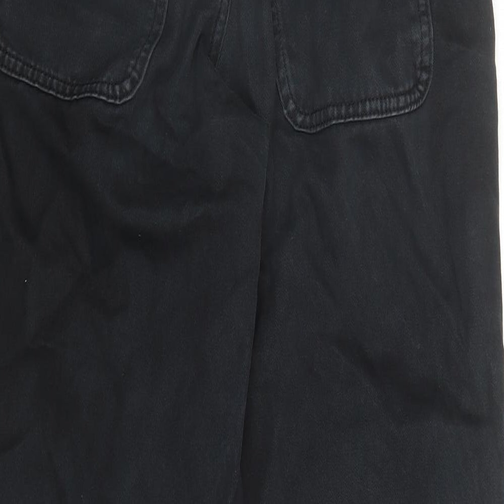 Brand and care label for ASOS women’s black cotton mom jeans, size UK 6, 29-inch leg regular zip