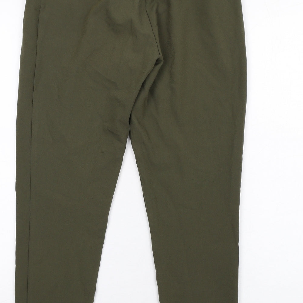 Brand and care label for Missguided women’s green polyester dress pants trousers, size UK 8, 29-inch leg regular zip