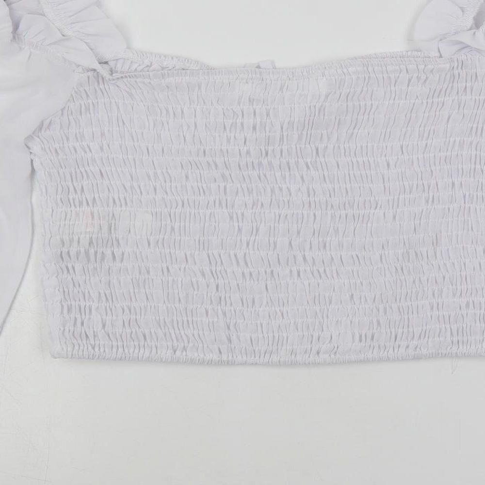 Brand and care label for Missguided women’s white polyester cropped blouse, size UK 12, square neck - shirred