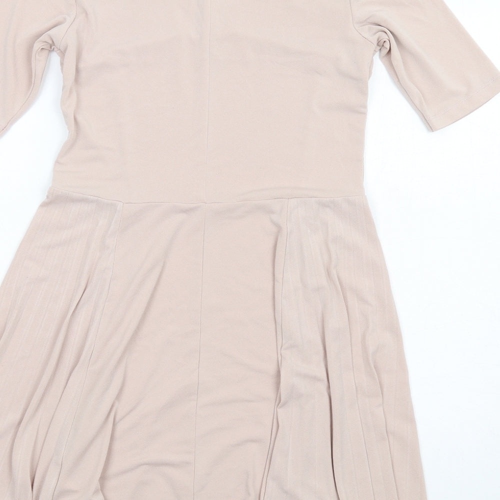 Brand and care label for ASOS women’s pink polyester fit & flare, size UK 10, v-neck pullover