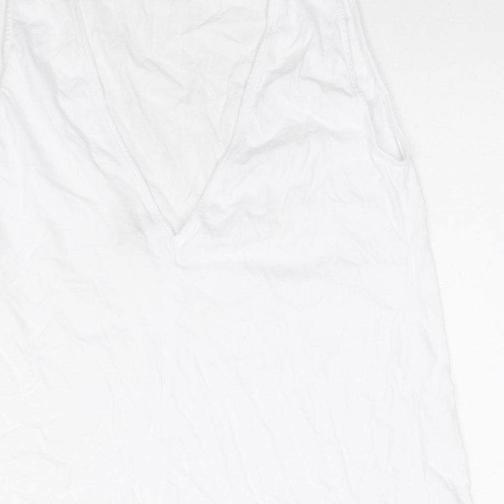 Brand and care label for ASOS women’s white cotton basic tank, size UK 12, round neck