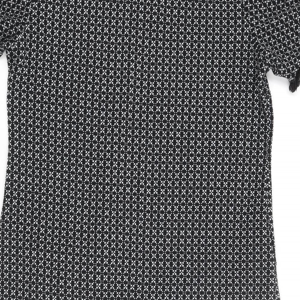Brand and care label for Miss Selfridge women’s black geometric polyester shift, size UK 12, round neck button
