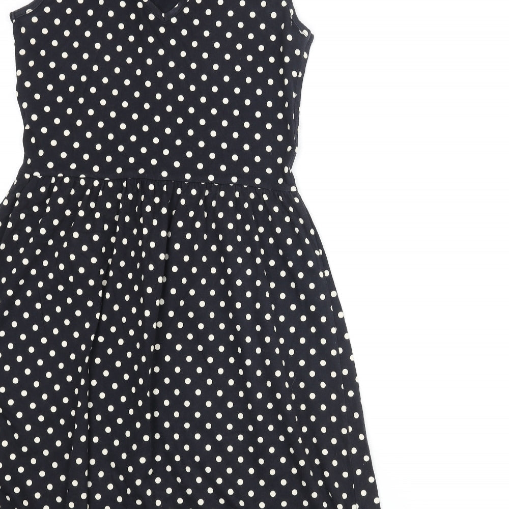 Brand and care label for Only women’s black polka dot polyester a-line, size S, round neck pullover