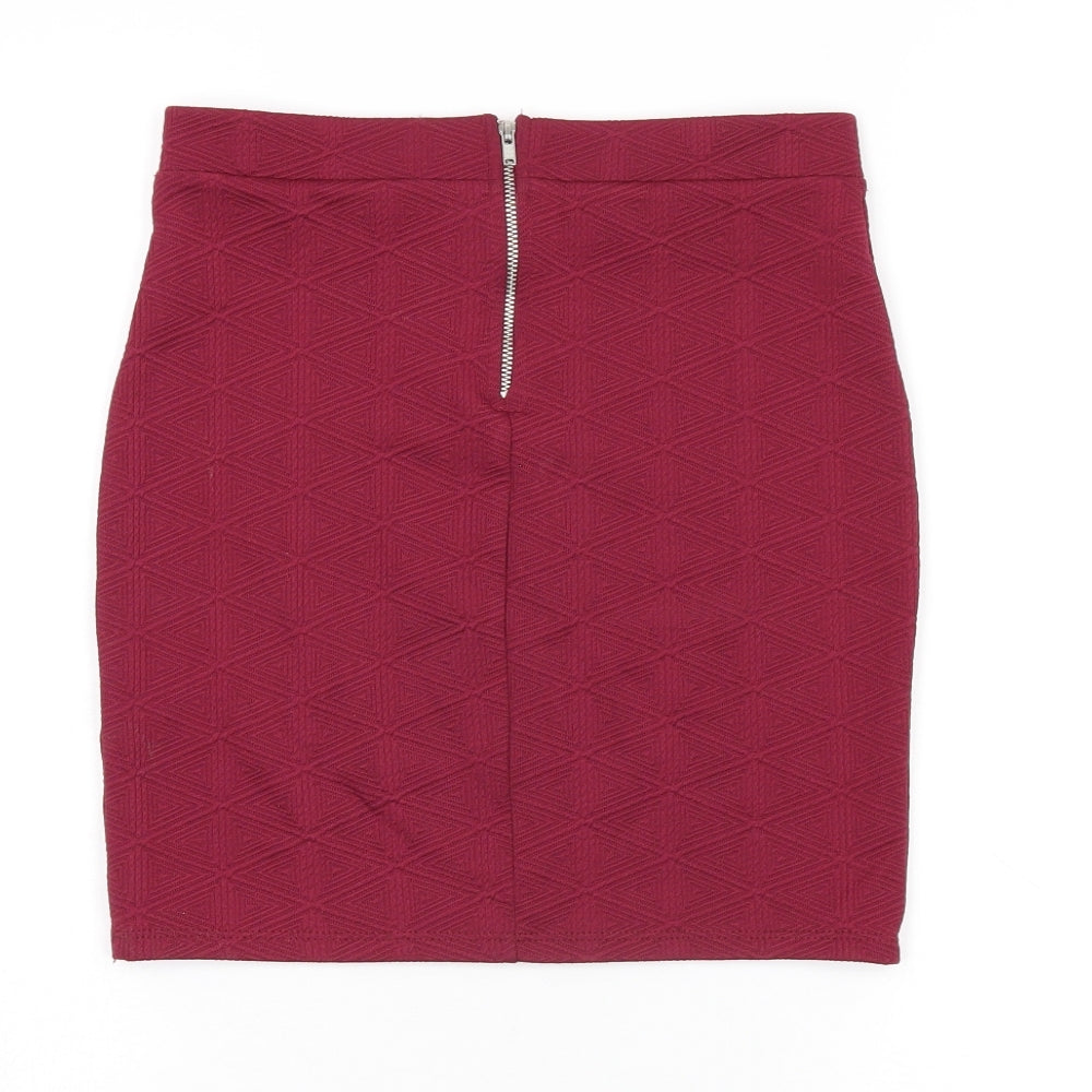 Brand and care label for Miss Selfridge women’s red polyester mini skirt, size UK 8, zip