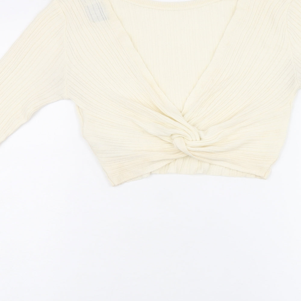 Brand and care label for ASOS women’s beige acrylic cropped t-shirt, size UK 10, round neck - twist detail on back