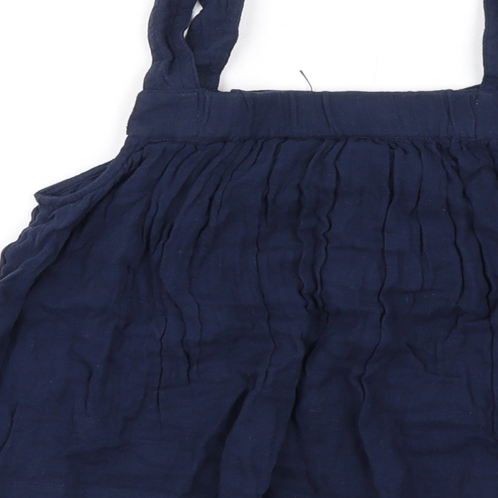 Brand and care label for Marks & Spencer girls’ blue cotton basic tank, size 10-11, years square neck pullover