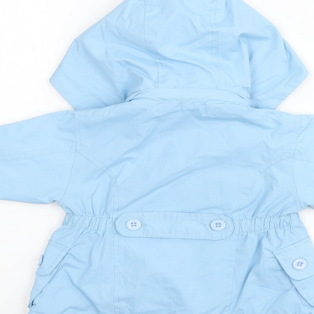 Brand and care label for Martis girls’ blue overcoat coat, size S, zip