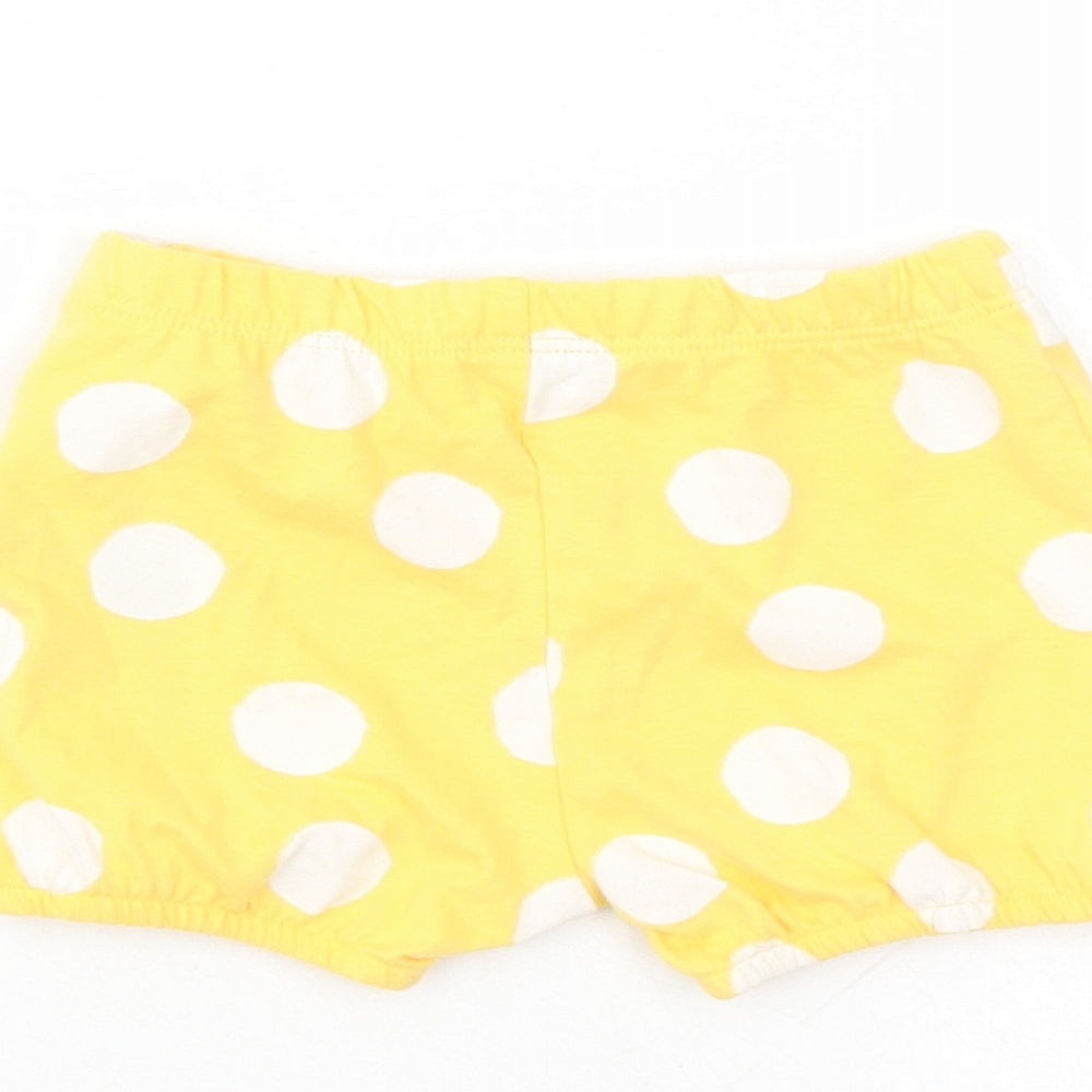 Brand and care label for Marks & Spencer girls’ yellow polka dot 100% cotton capri trousers, months - elasticated waist bow