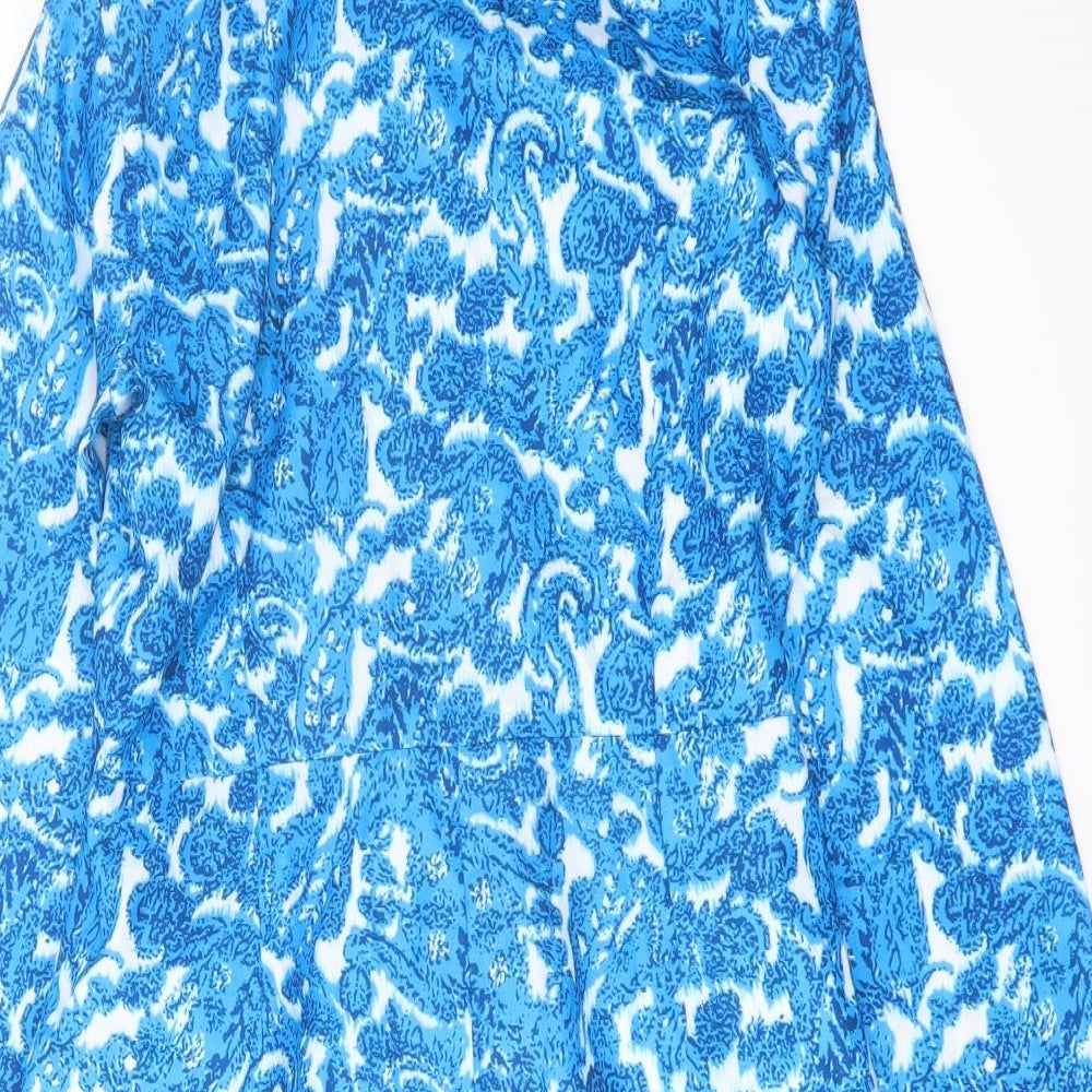Brand and care label for In the Style women’s blue geometric polyester playsuit one-piece, size UK 10, pullover