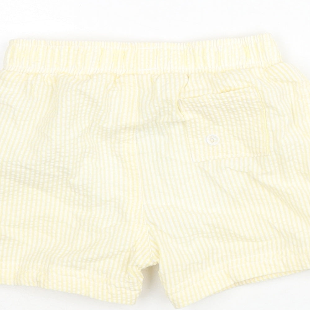 Brand and care label for Marks & Spencer boys’ yellow striped polyester cropped trousers, months drawstring - swim shorts