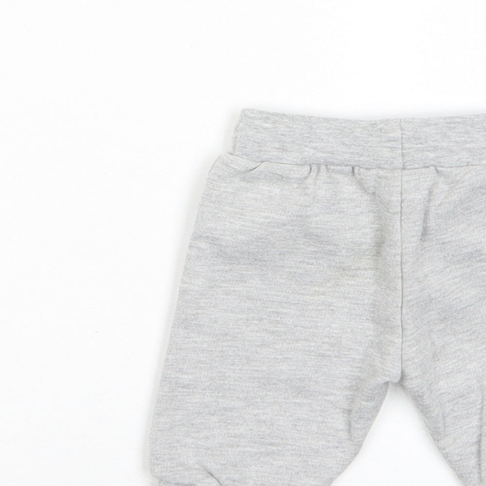 Brand and care label for Disney boys’ grey polyester jogger trousers, size 0-3, months drawstring - pockets