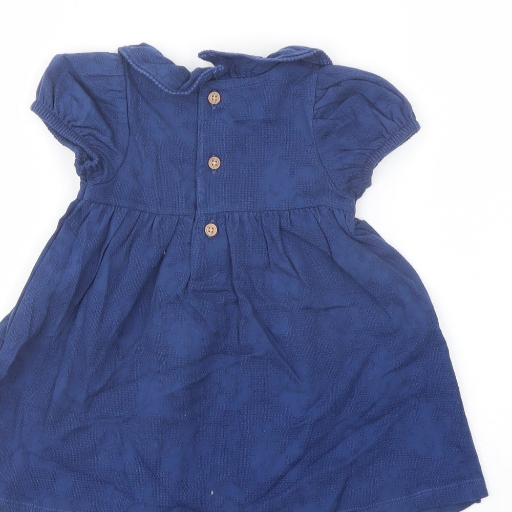 Brand and care label for Marks & Spencer girls’ blue cotton a-line, size 3-6, months collared button