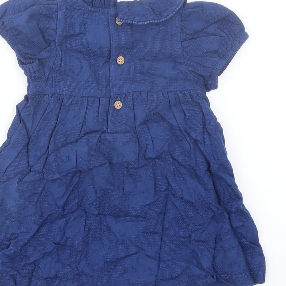 Brand and care label for Marks & Spencer girls’ blue cotton a-line, size 3-6, months collared button