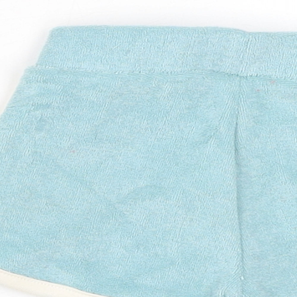 Brand and care label for Marks & Spencer boys’ blue cotton cropped trousers, size 3-6, months drawstring - inside leg 2in