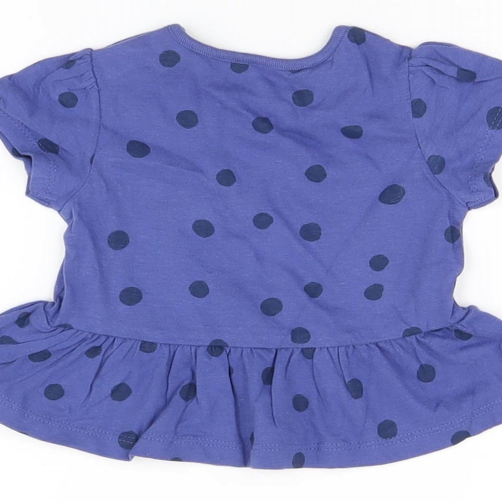 Brand and care label for Marks & Spencer girls’ blue polka dot cotton basic t-shirt, size 3-6, months round neck snap