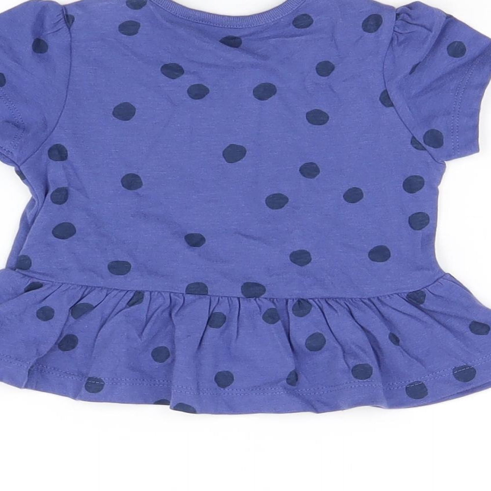 Brand and care label for Marks & Spencer girls’ blue polka dot cotton basic t-shirt, size 3-6, months round neck snap