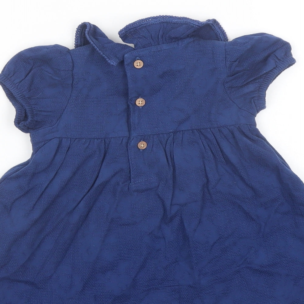 Brand and care label for Marks & Spencer girls’ blue cotton a-line, size 3-6, months collared button