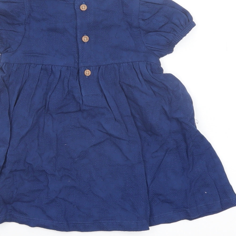 Brand and care label for Marks & Spencer girls’ blue cotton a-line, size 3-6, months collared button