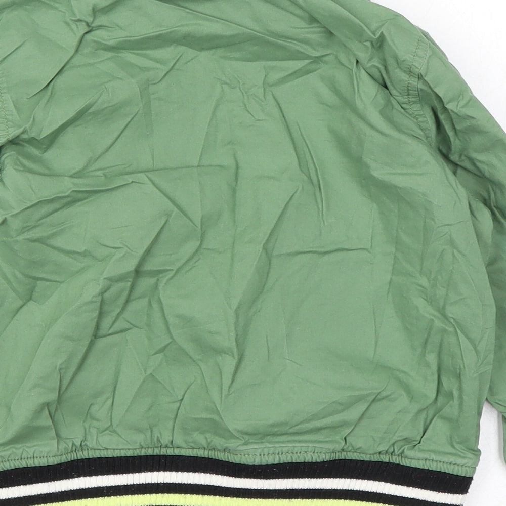 Brand and care label for Mini Club boys’ green bomber jacket jacket, size 2-3, years zip
