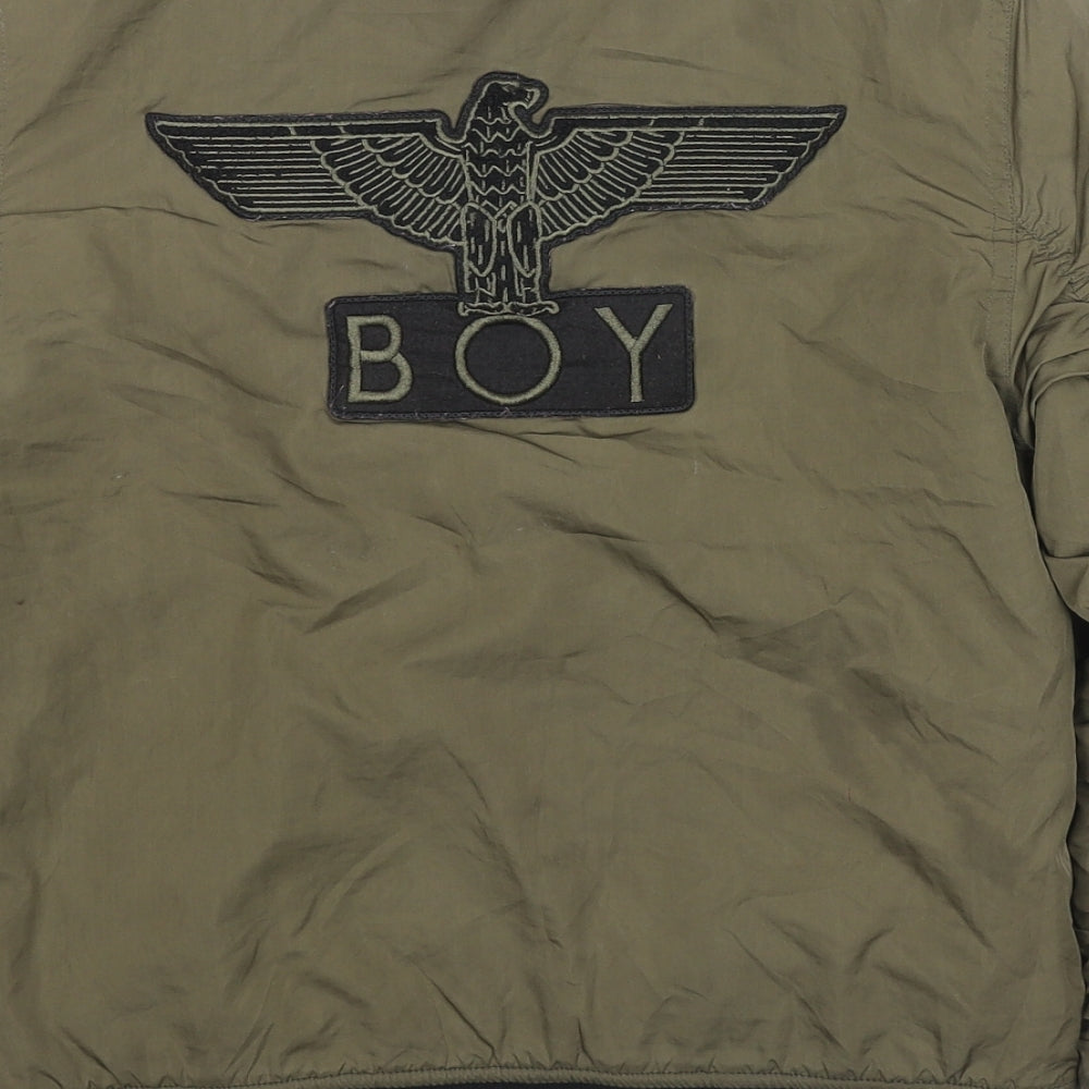 Brand and care label for BOY London girls’ green jacket, size 11-12, years zip