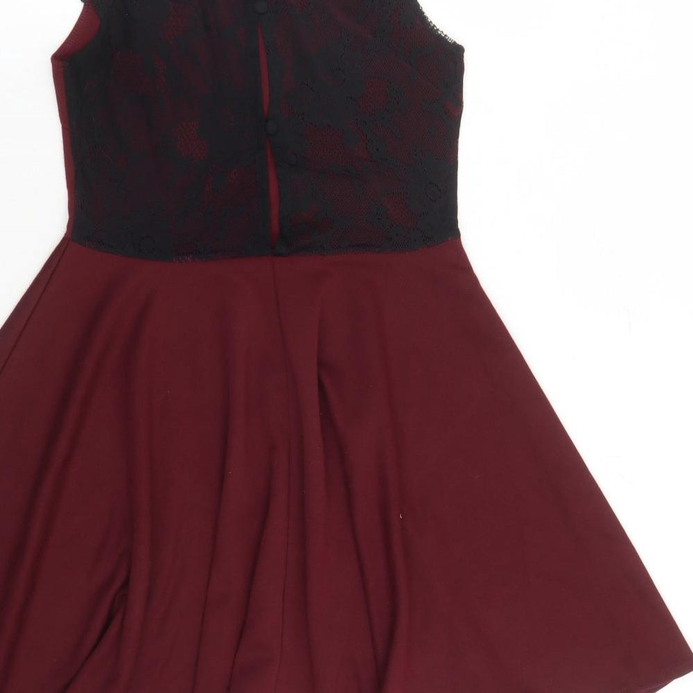Brand and care label for Club L women’s red polyester skater dress, size UK 10, round neck button