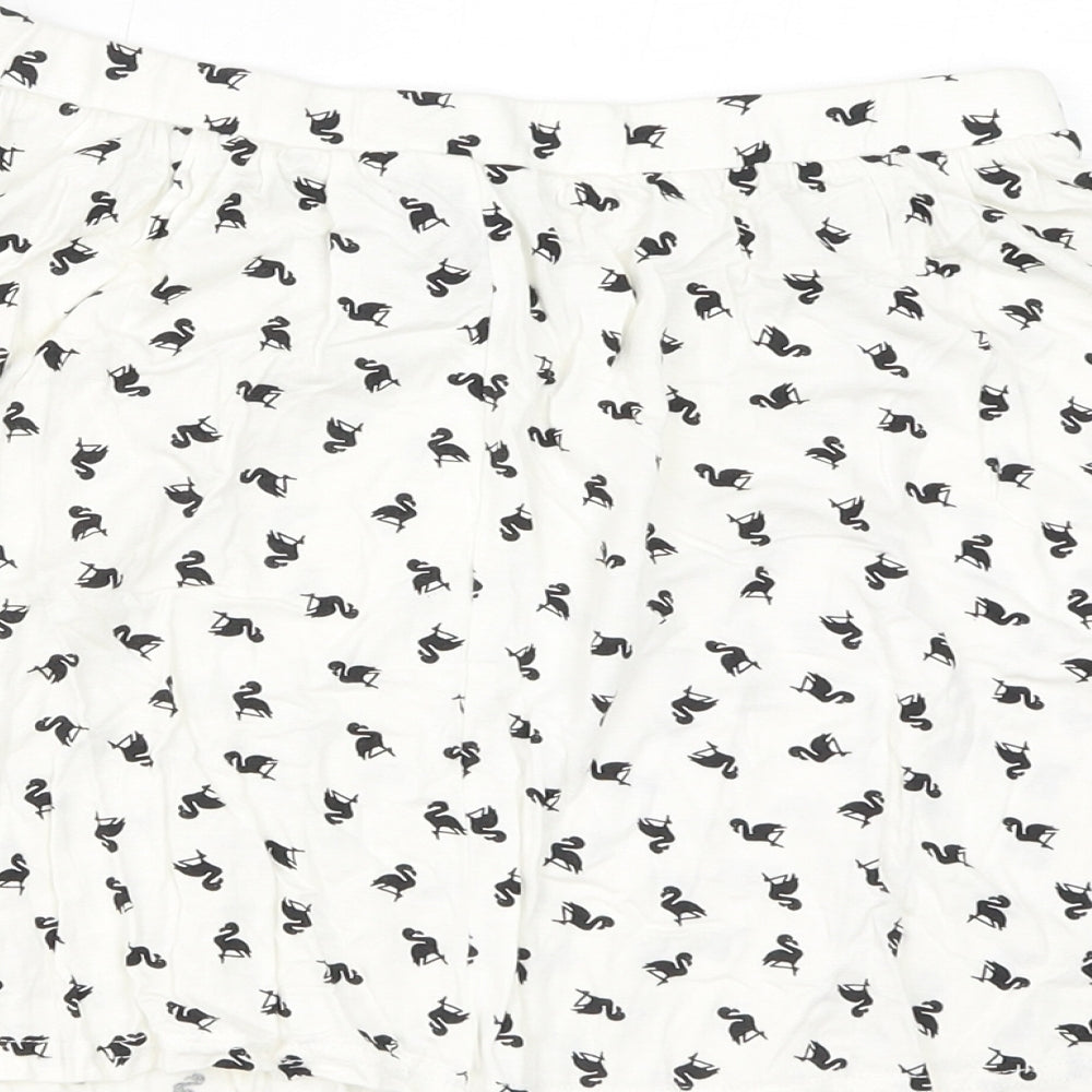 Brand and care label for ASOS women’s white geometric viscose mini skirt, size UK 10, - flamingos