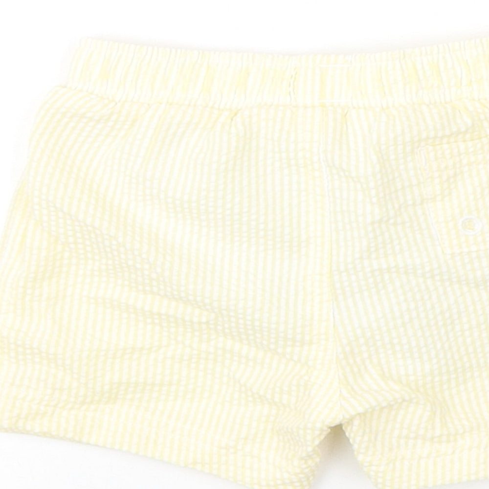 Brand and care label for Marks & Spencer boys’ yellow striped polyester cropped trousers, months drawstring - swim shorts