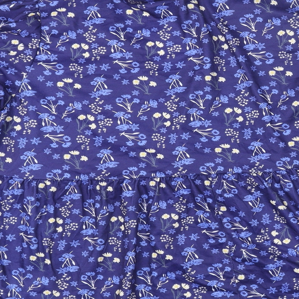 Brand and care label for In the Style women’s blue floral polyester basic blouse, size UK 16, v-neck - peplum