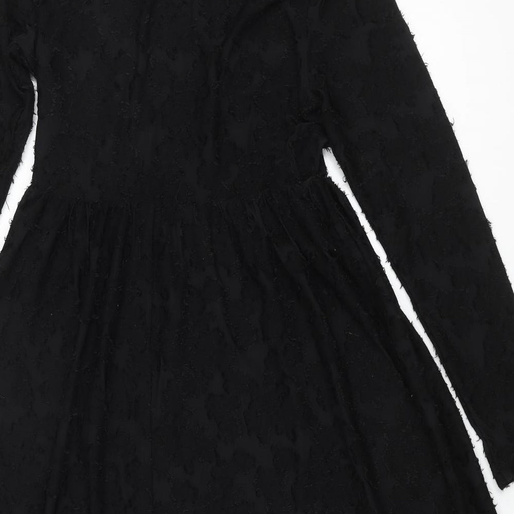 Brand and care label for JDY women’s black polyester a-line, size S, round neck pullover - textured